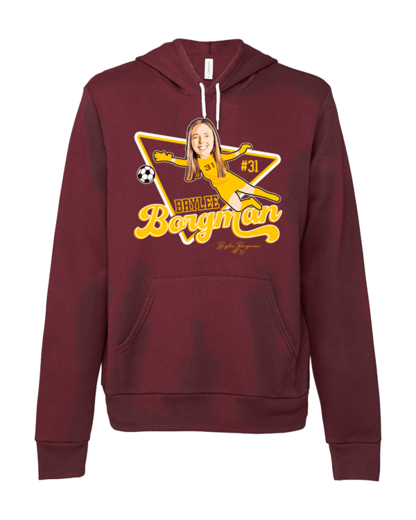 A maroon hoodie with a picture of a girl in yellow.