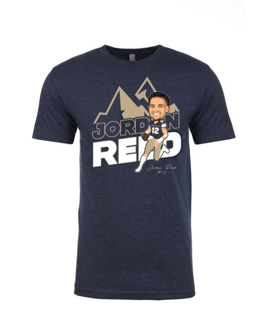 A navy blue t-shirt with a cartoon of a man in front of mountains.