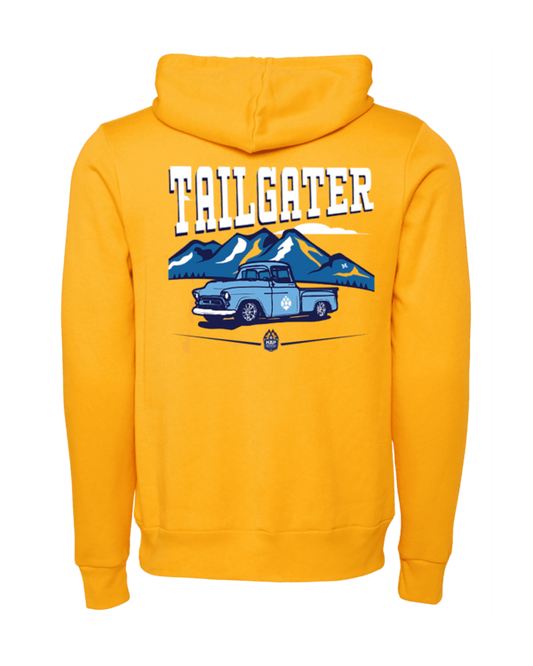 A yellow hoodie with an image of a truck and mountains.