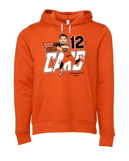 A man in an orange hoodie with the number 1 2 on it.